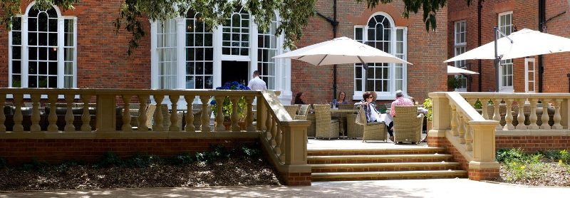 Chilstone handmake balustrade to create a terrace for alfresco dining.